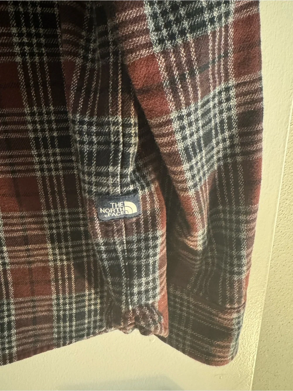 The North Face plaid button